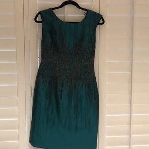 Midi length green and gray dress.